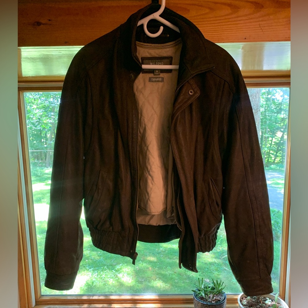 Brown Wilson’s leather bomber jacket